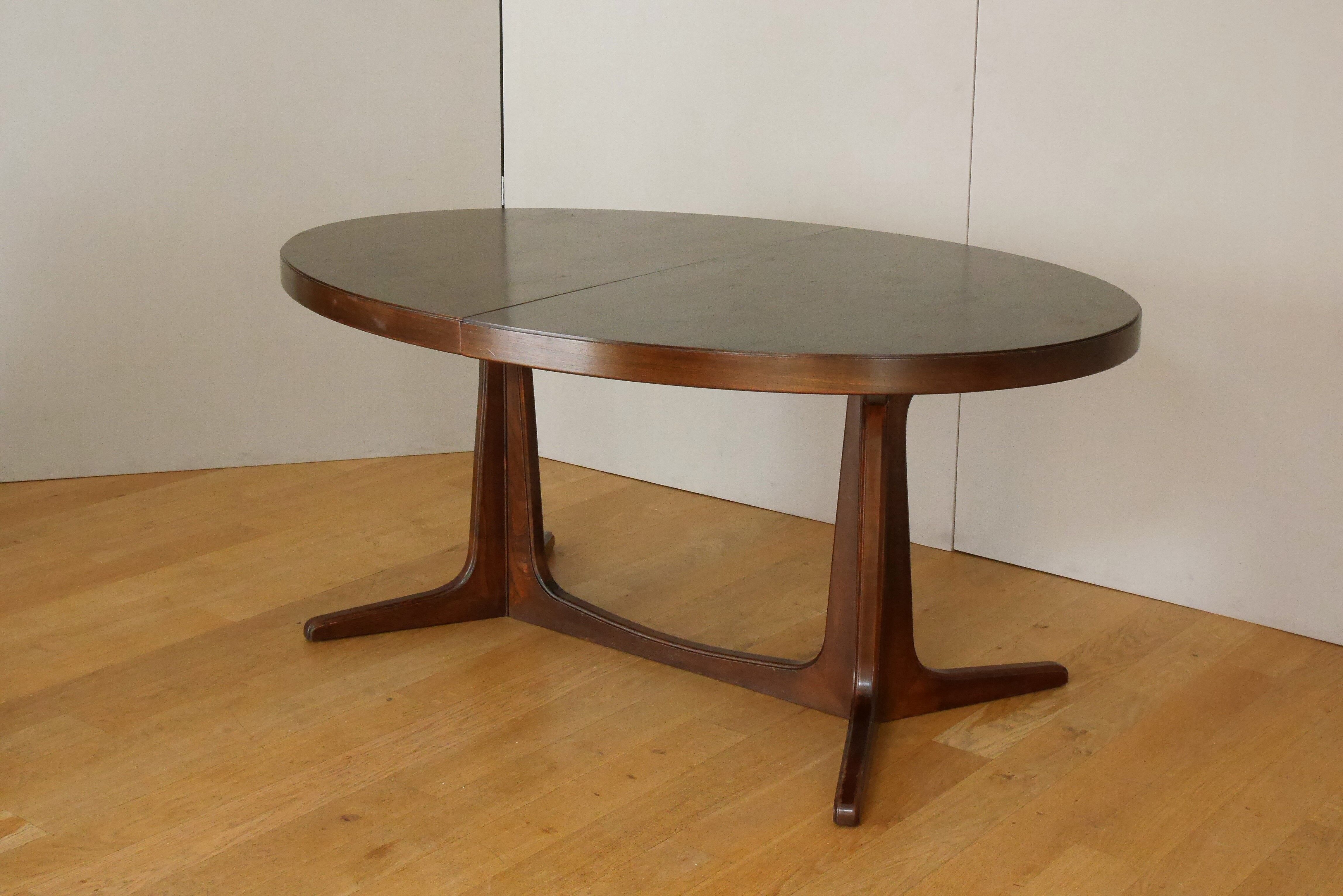 Extendable oval elm table with Baumann extensions