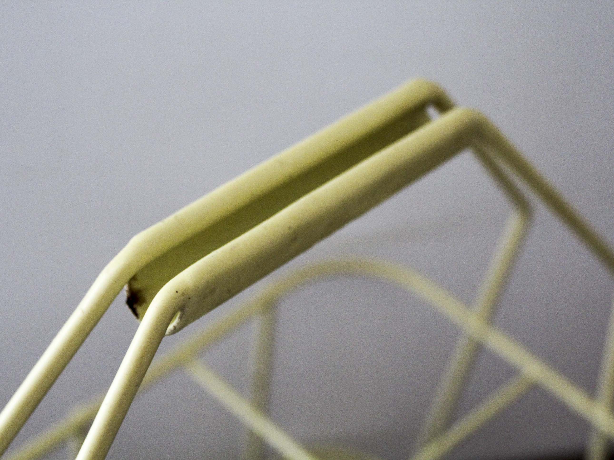 Yellow metal bottle holder