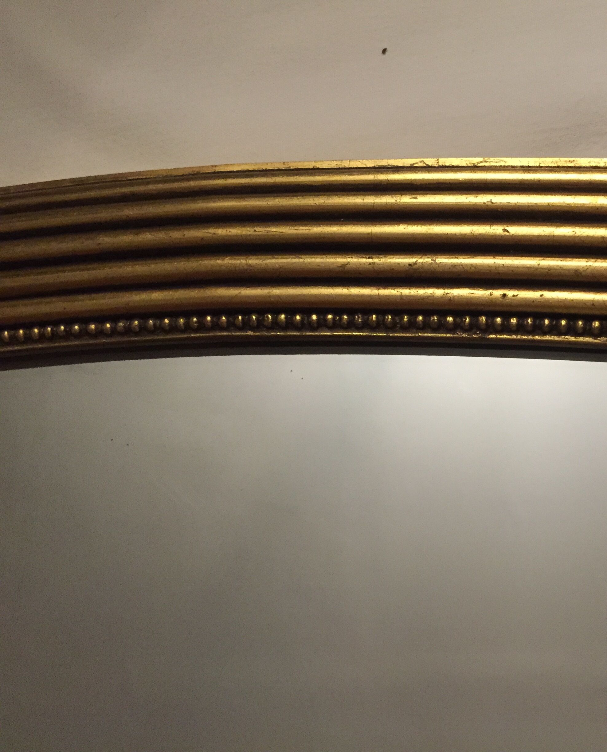 Miroir ovale en bois doré 85x43 cm