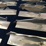 12 knife holders signed Yorel Art Deco
