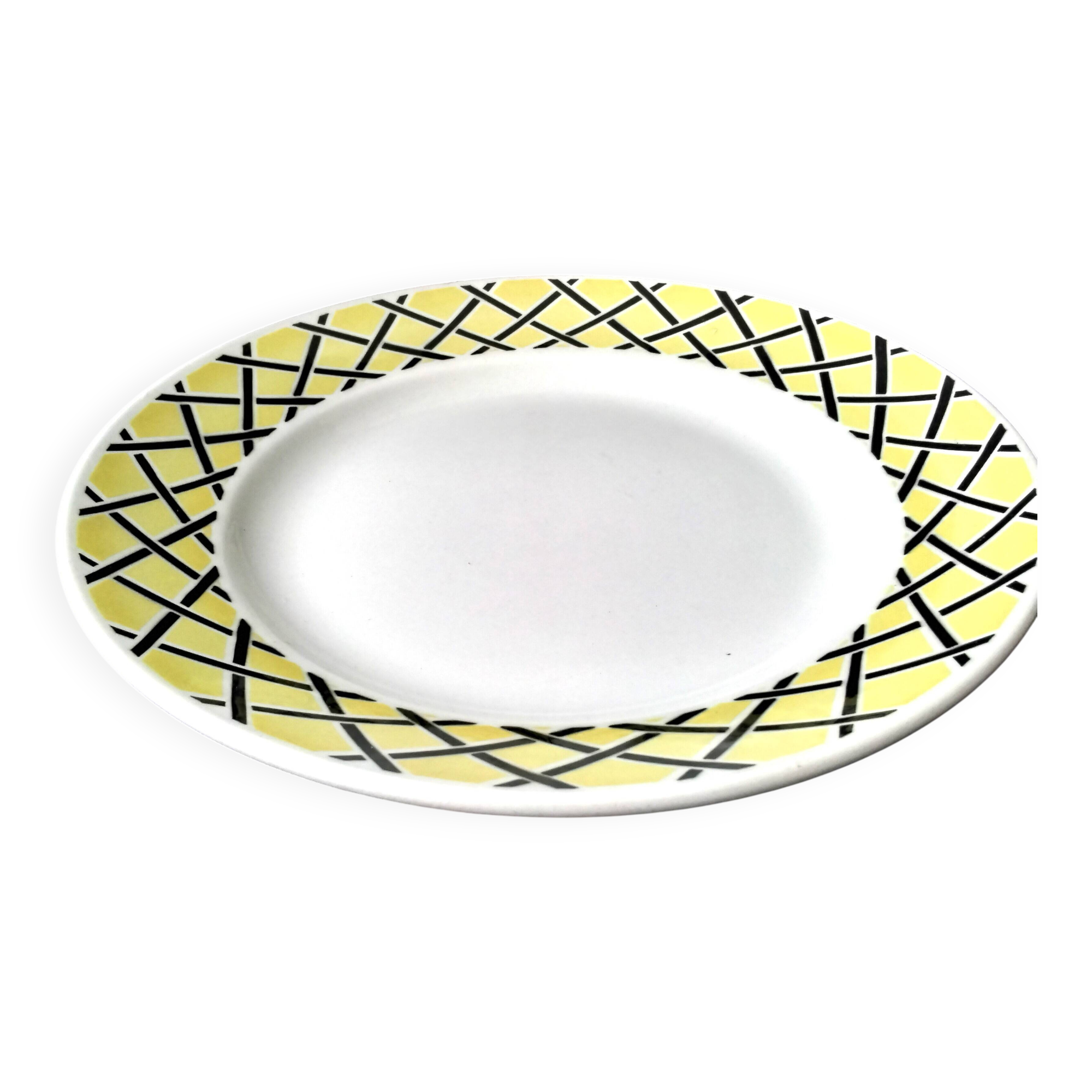 Plat rond semi-creux en faïence de Badonviller