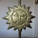 Pair of "sun" candlesticks in metal and wood from the 80s