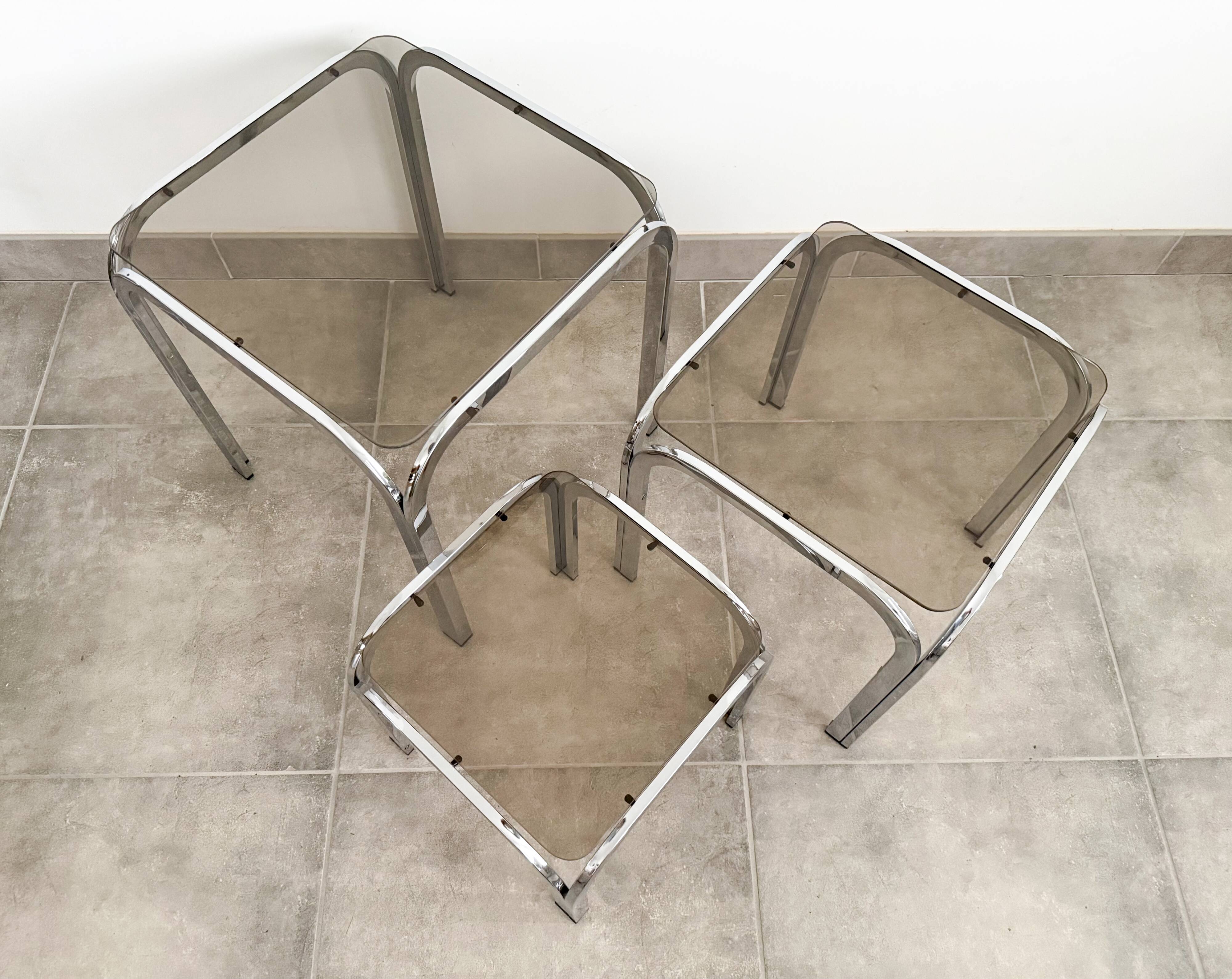 Set of 3 nesting tables, chrome and smoked glass, 1970s.
