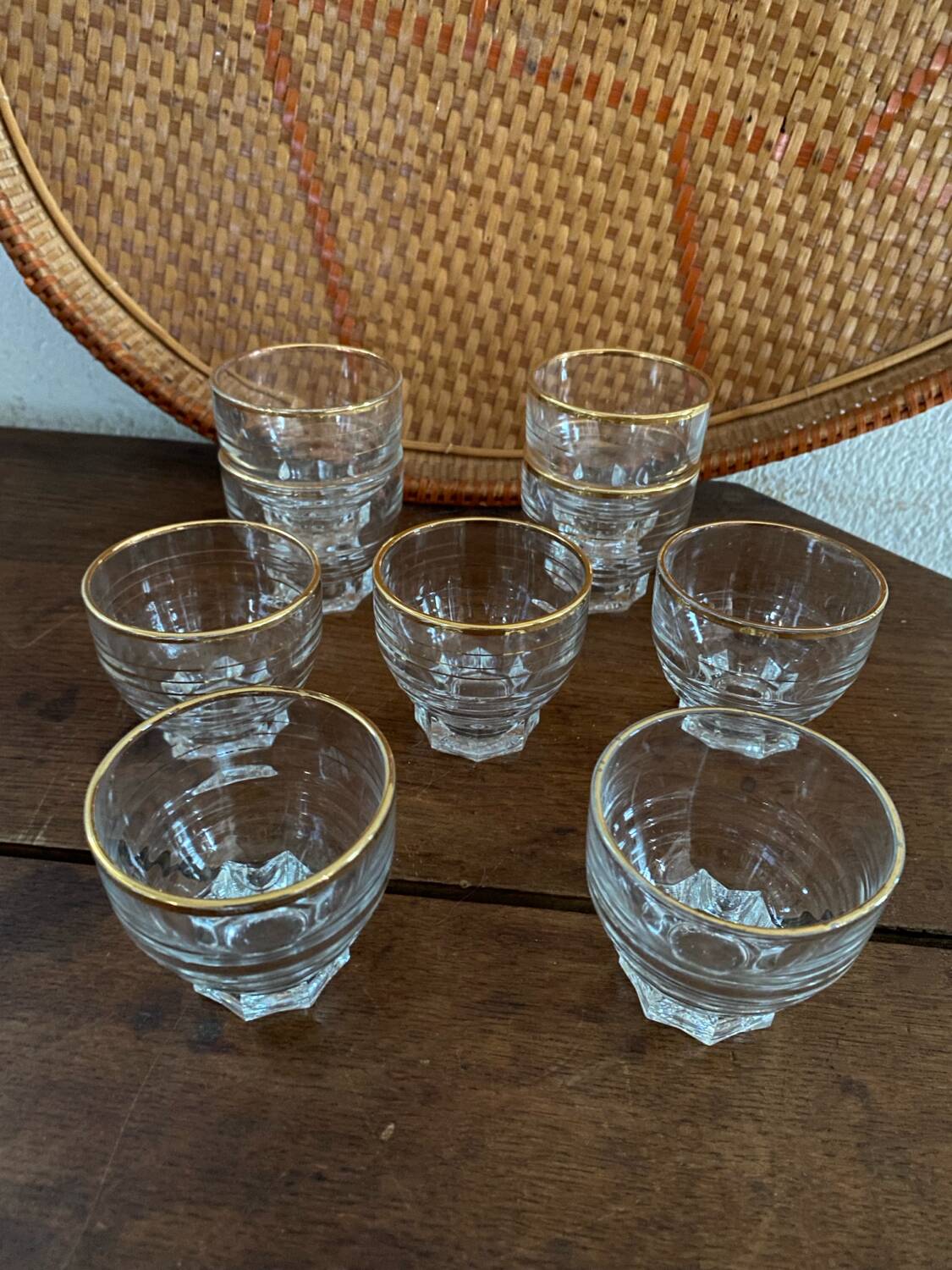 9 vintage gold rimmed glasses.