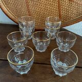9 vintage gold rimmed glasses.