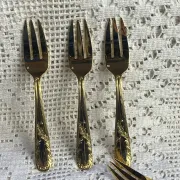 Fourchettes à dessert en métal doré 