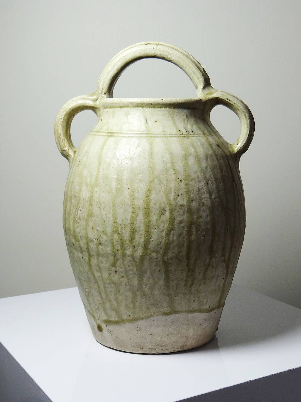 Green ash-glazed stoneware casserole from Puisaye, late 19th to early 20th century.