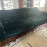 Dark green velvet sofa