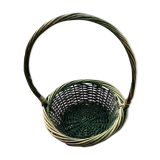 Green wicker basket with a large vintage handle