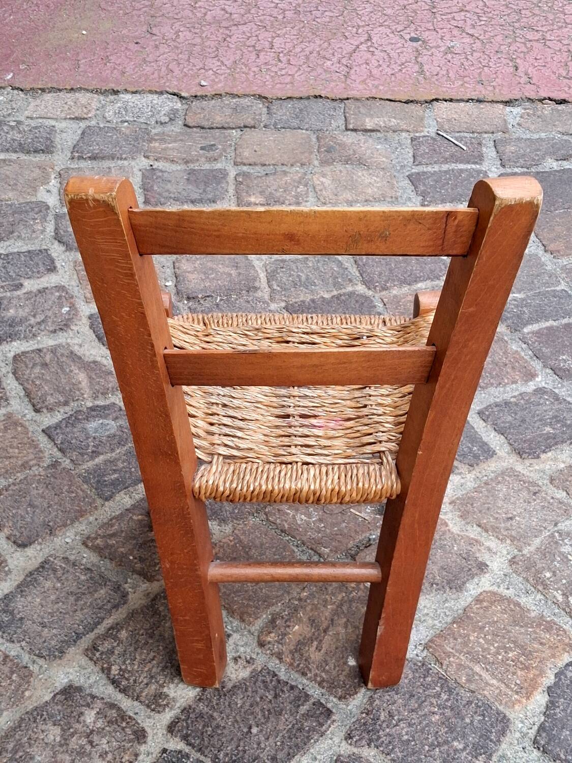 Small chair for children, folk art, wood and straw.