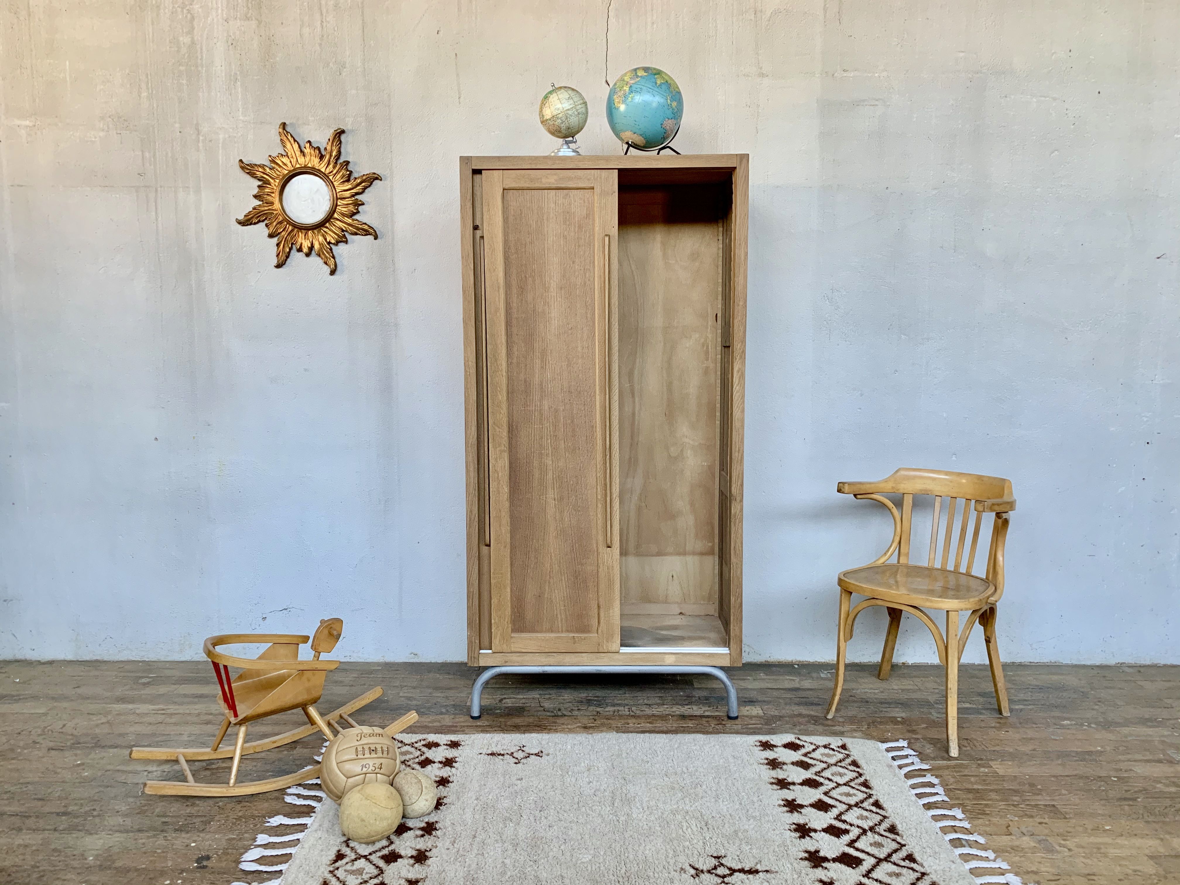 Vintage Parisian school cabinet tubular feet year 1950