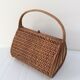 Basket in woven rattan from the 60's