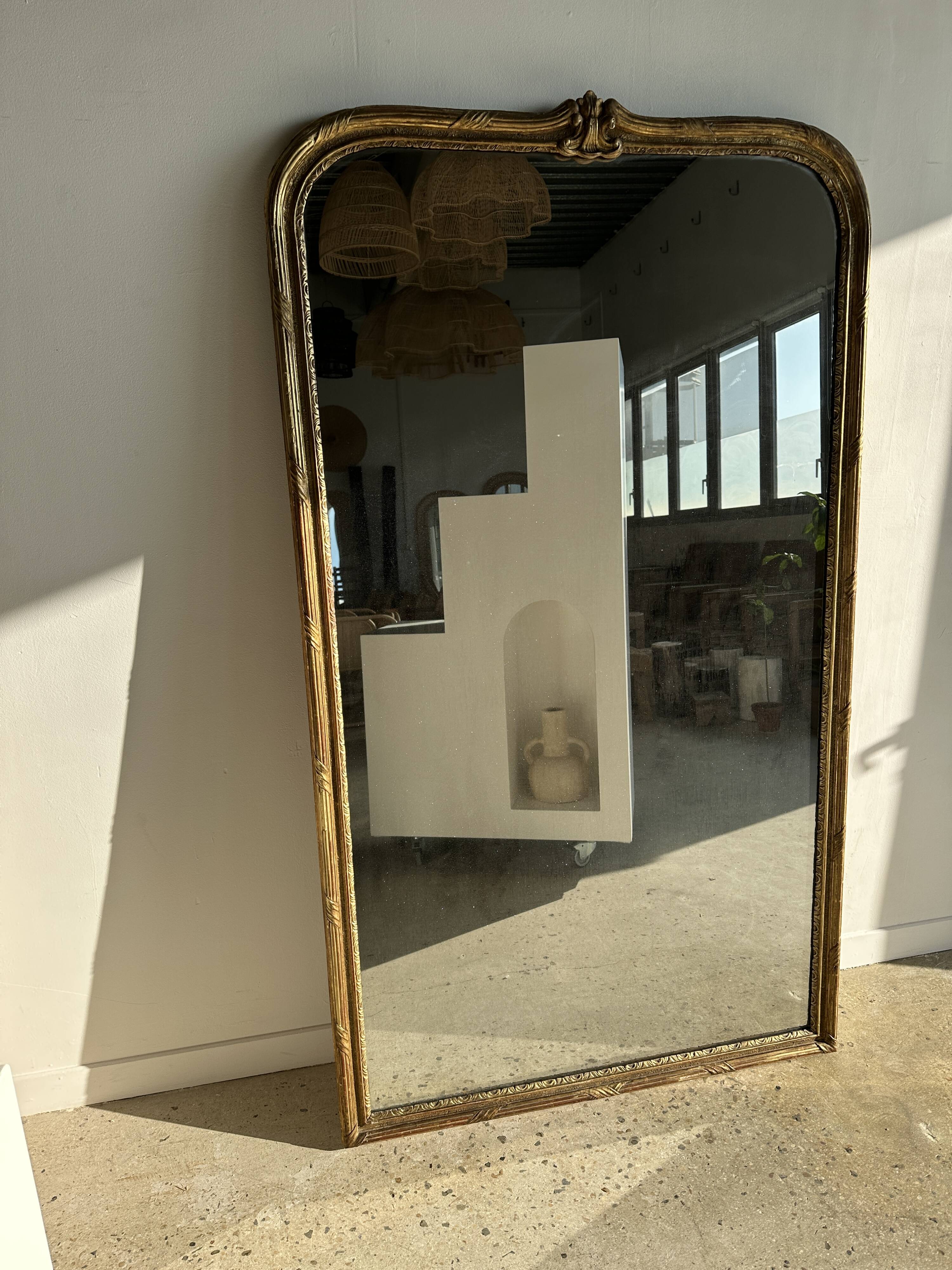 Large gilded mirror 19th century rounded corners mercury glass Louis XVI style