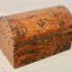 Old wooden and studded leather box