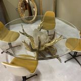 Round glass and brass table by designers Richard and Isabelle Faure