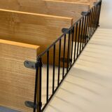 Floating wall shelf in oak veneer and black metal, 1960s.