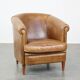 Fauteuil club en cuir de vachette couleur cognac clair