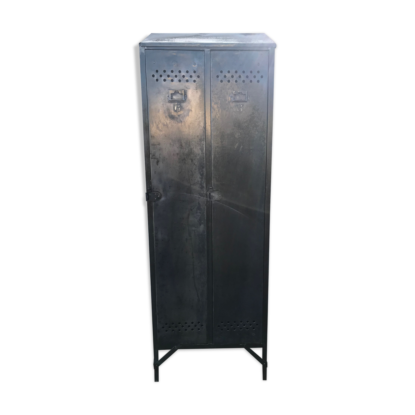 Antique riveted metal cloakroom