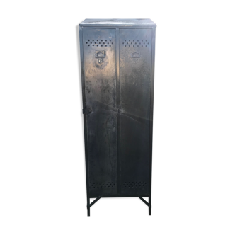 Antique riveted metal cloakroom