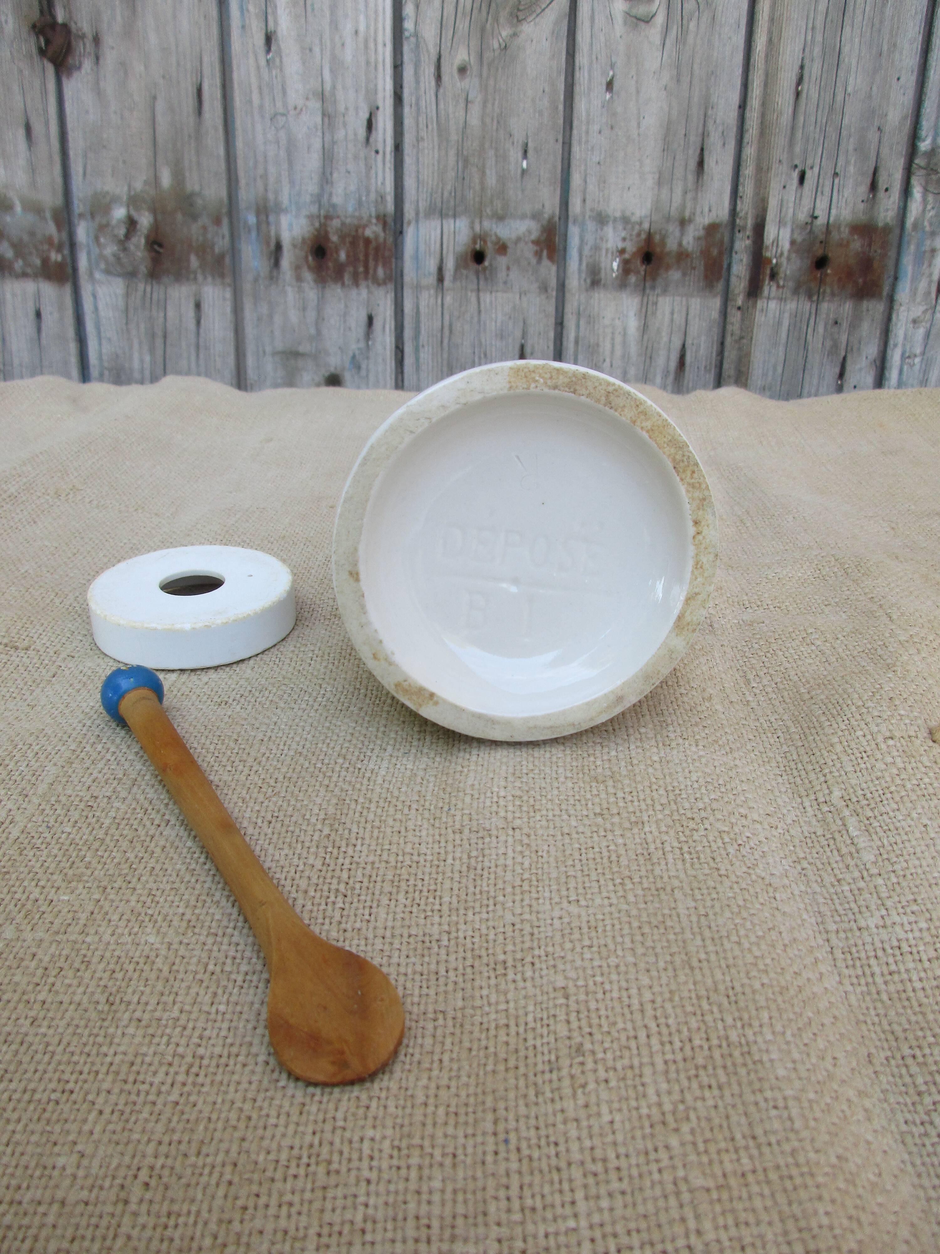 Old mustard pot in gres