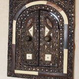 Vintage Moroccan mirror with chiseled pewter shutters