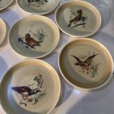 Many vintage flat plates from Sarreguemines.