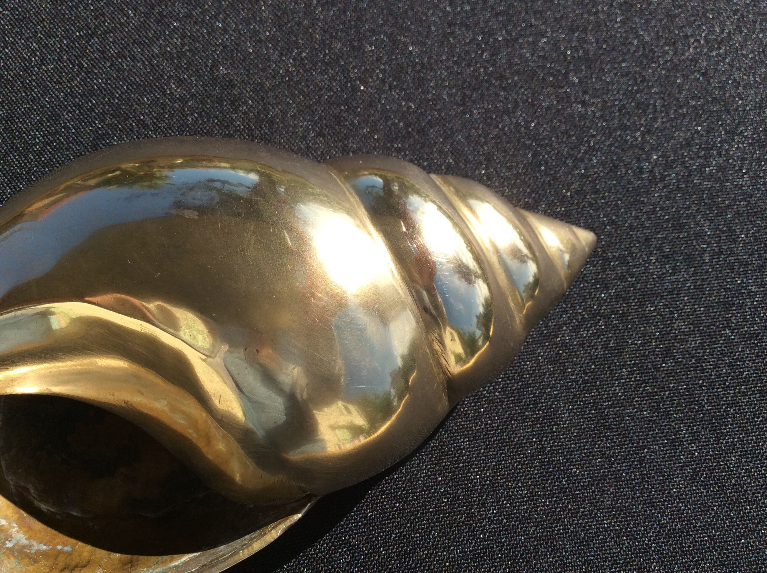Shell brass ashtray