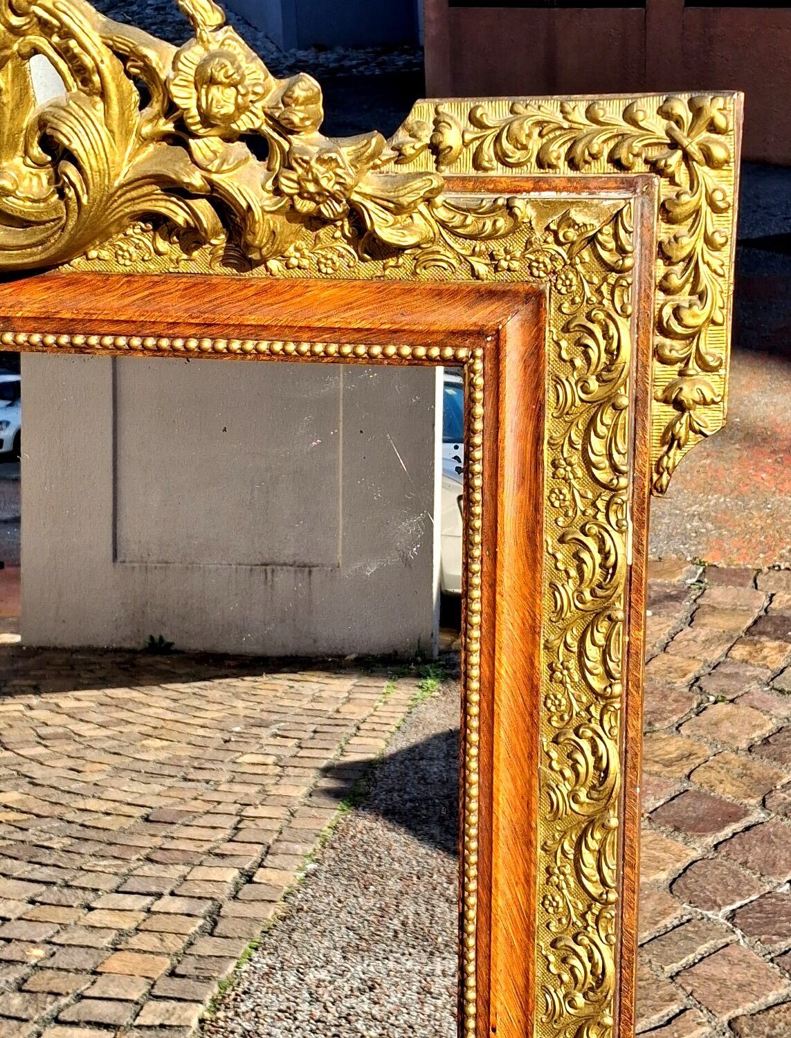 Authentic original Italian fireplace mirror, frame and pediment.