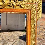 Authentic original Italian fireplace mirror, frame and pediment.