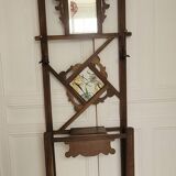 Old wooden locker room with beveled mirror