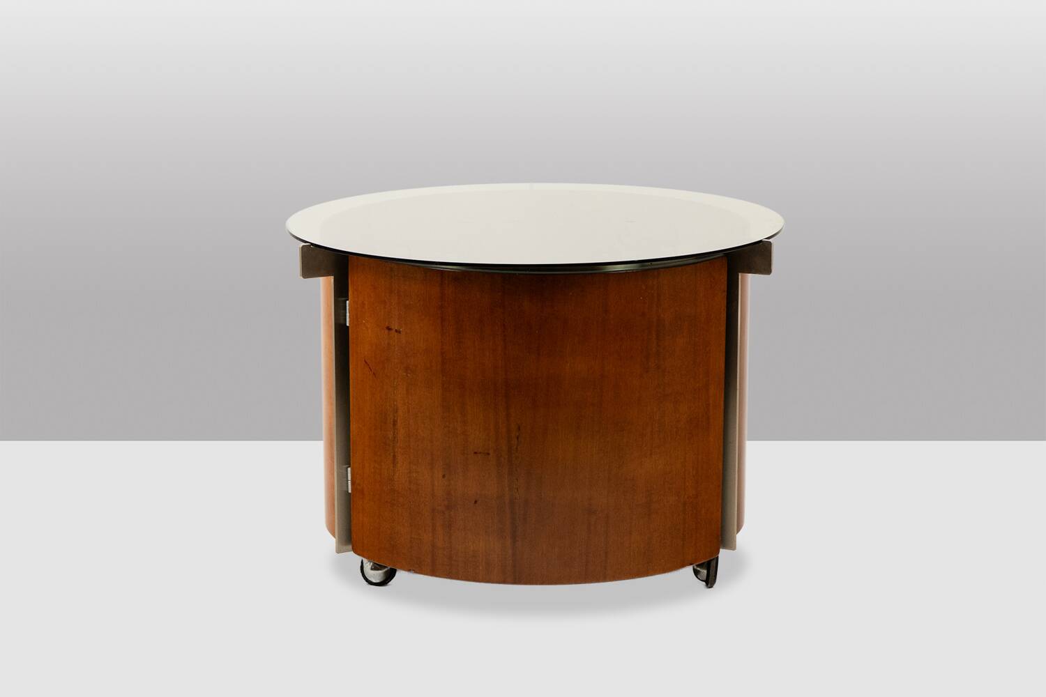 Eugenio Gerli, for Tecno. Round coffee table with integrated bar. Circa 1960.