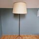 Vintage tripod floor lamp in black lacquered metal and brass, 50s