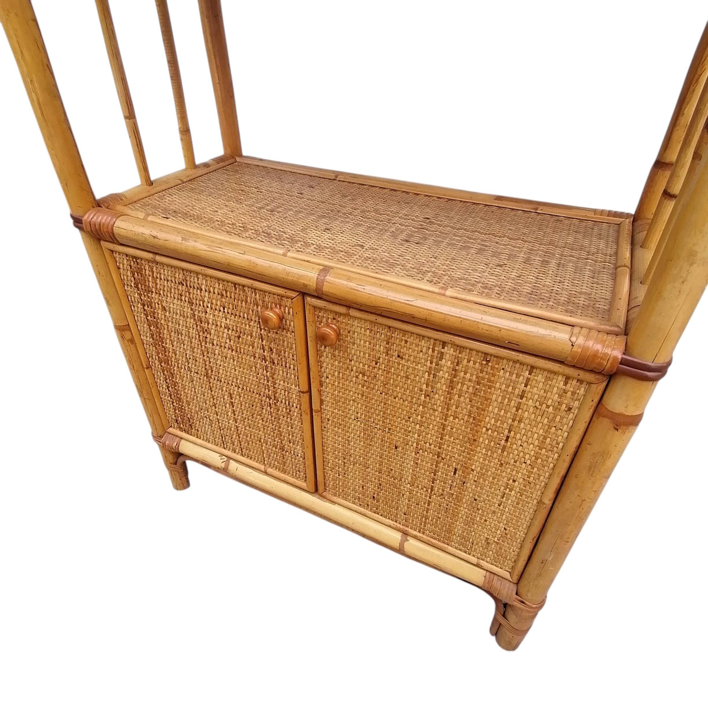 Bamboo and wicker bookshelf, vintage boho-chic from the '70s.