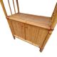 Bamboo and wicker bookshelf, vintage boho-chic from the '70s.