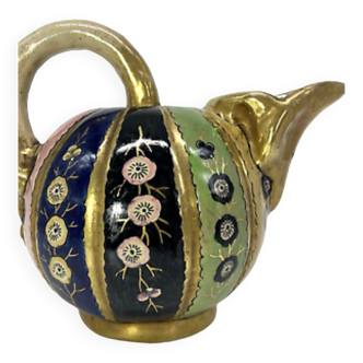 Pitcher with floral and enamelled decoration