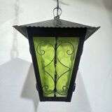 Wrought iron and green glass lantern