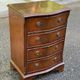 2 English wooden chests of drawers with 4 drawers