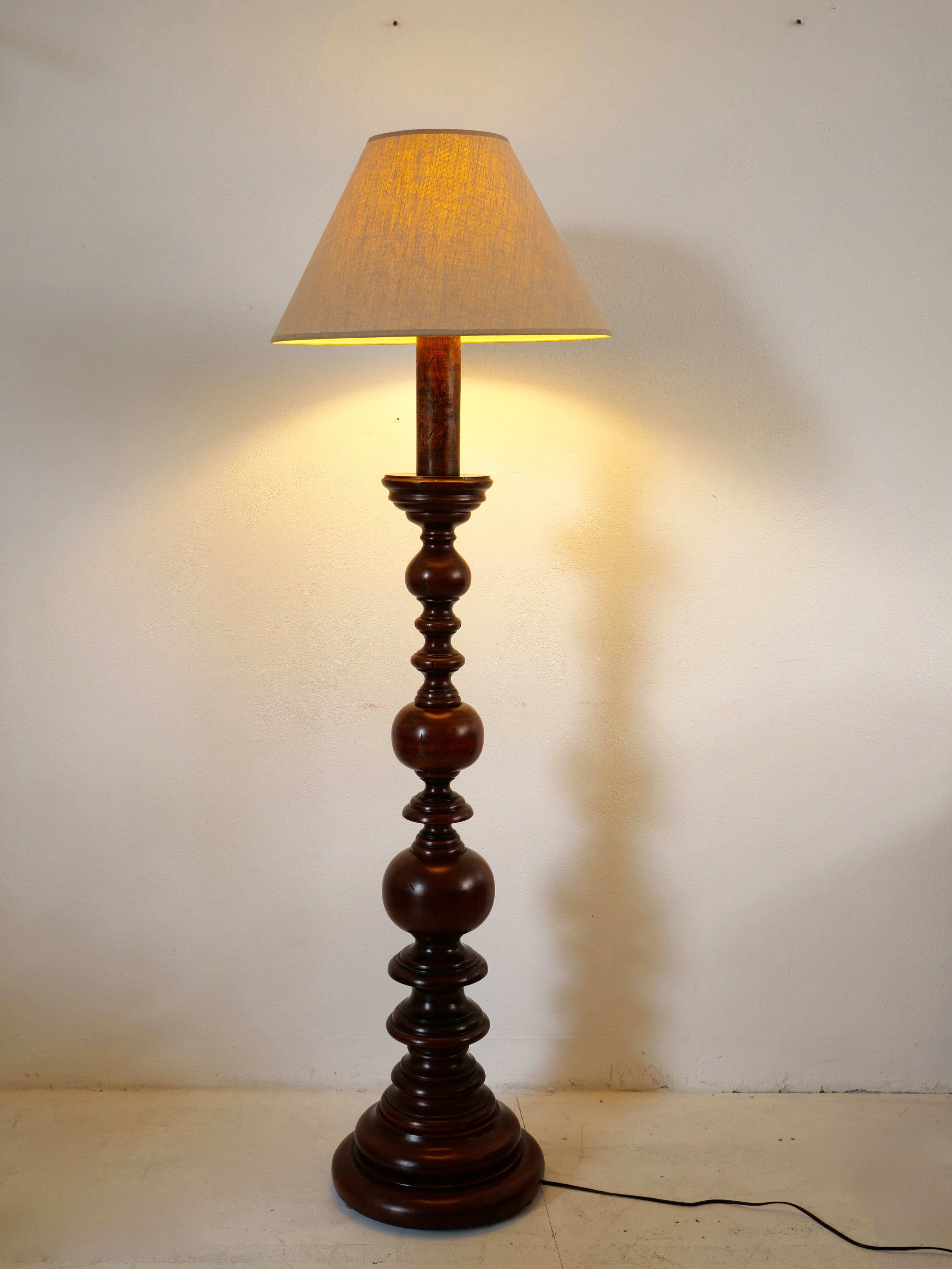 Turned wooden floor lamp