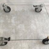 Beautiful designer glass coffee table on wheels