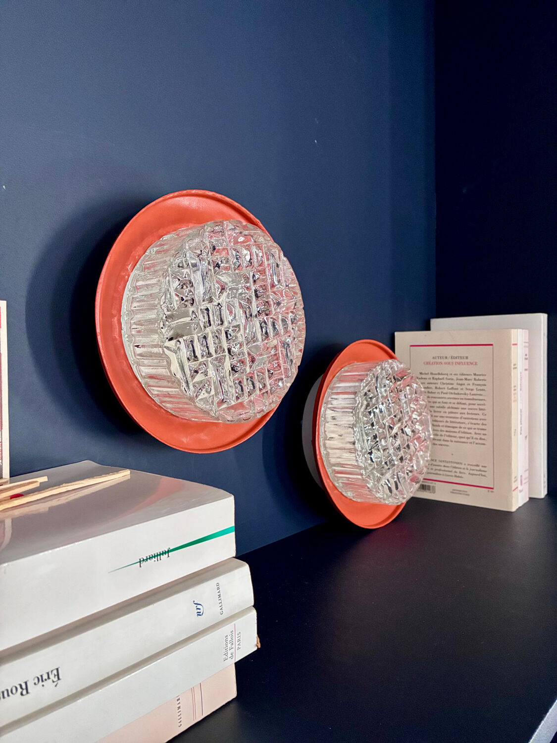 Pair of 70's wall lights in cut glass.