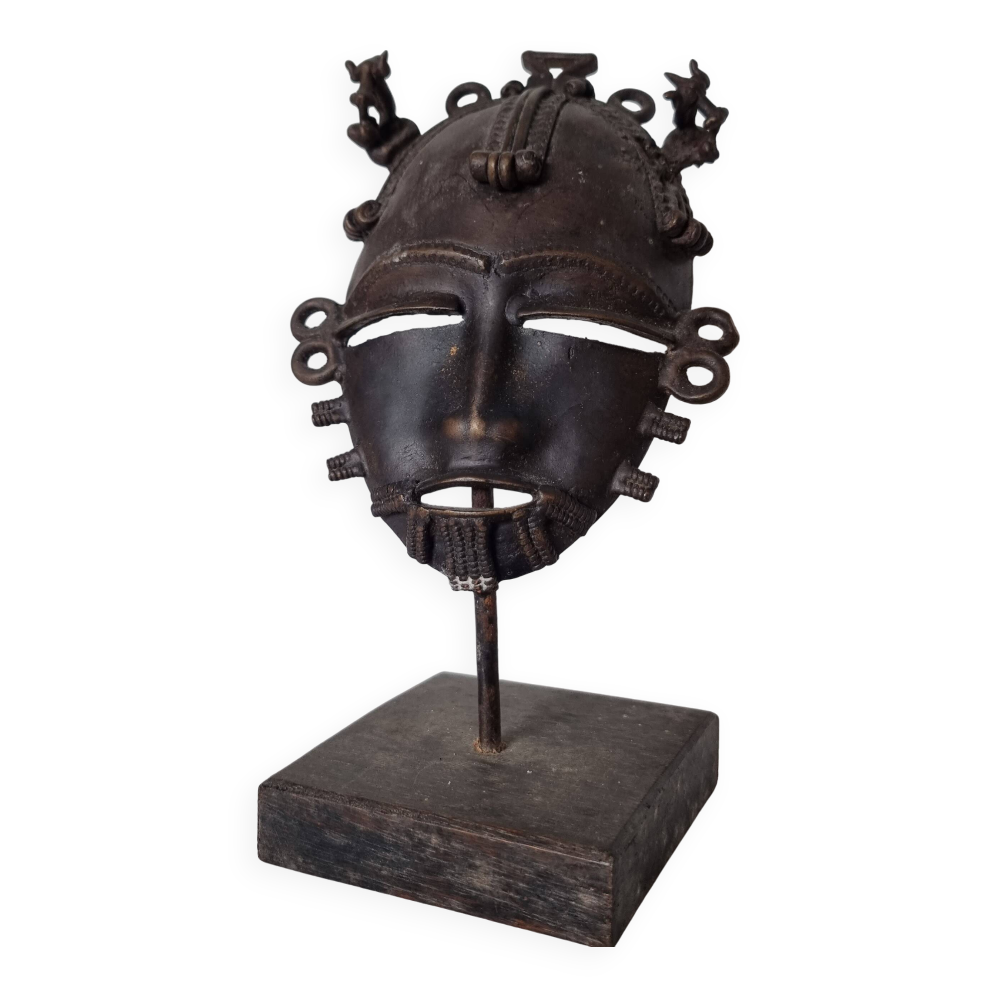 African bronze mask on pedestal, from Ivory Coast, dating