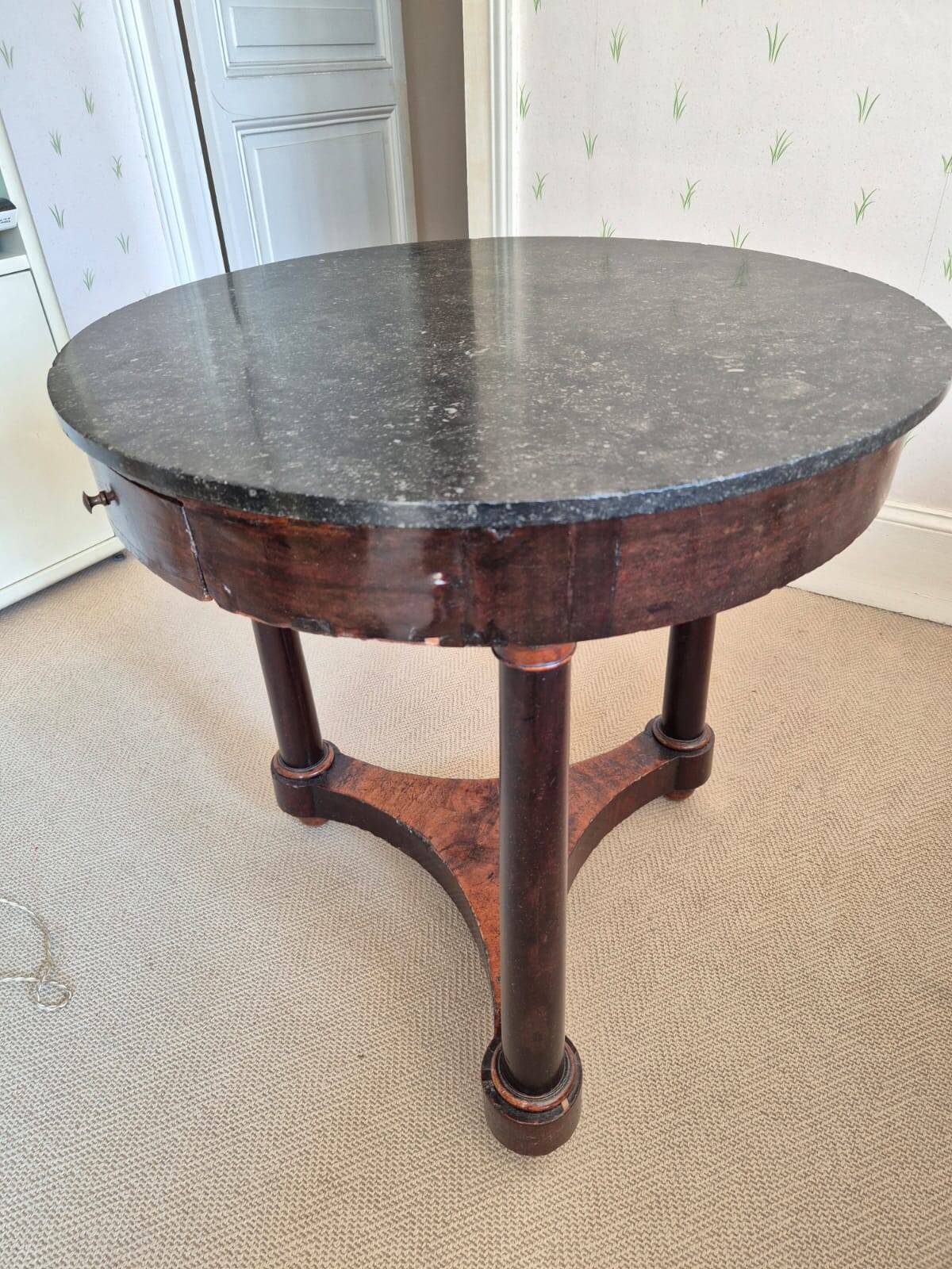 Mahogany side table with a marble top