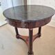 Mahogany side table with a marble top