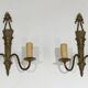 Pair of Louis XVI style bronze wall sconces with quivers and ribbons