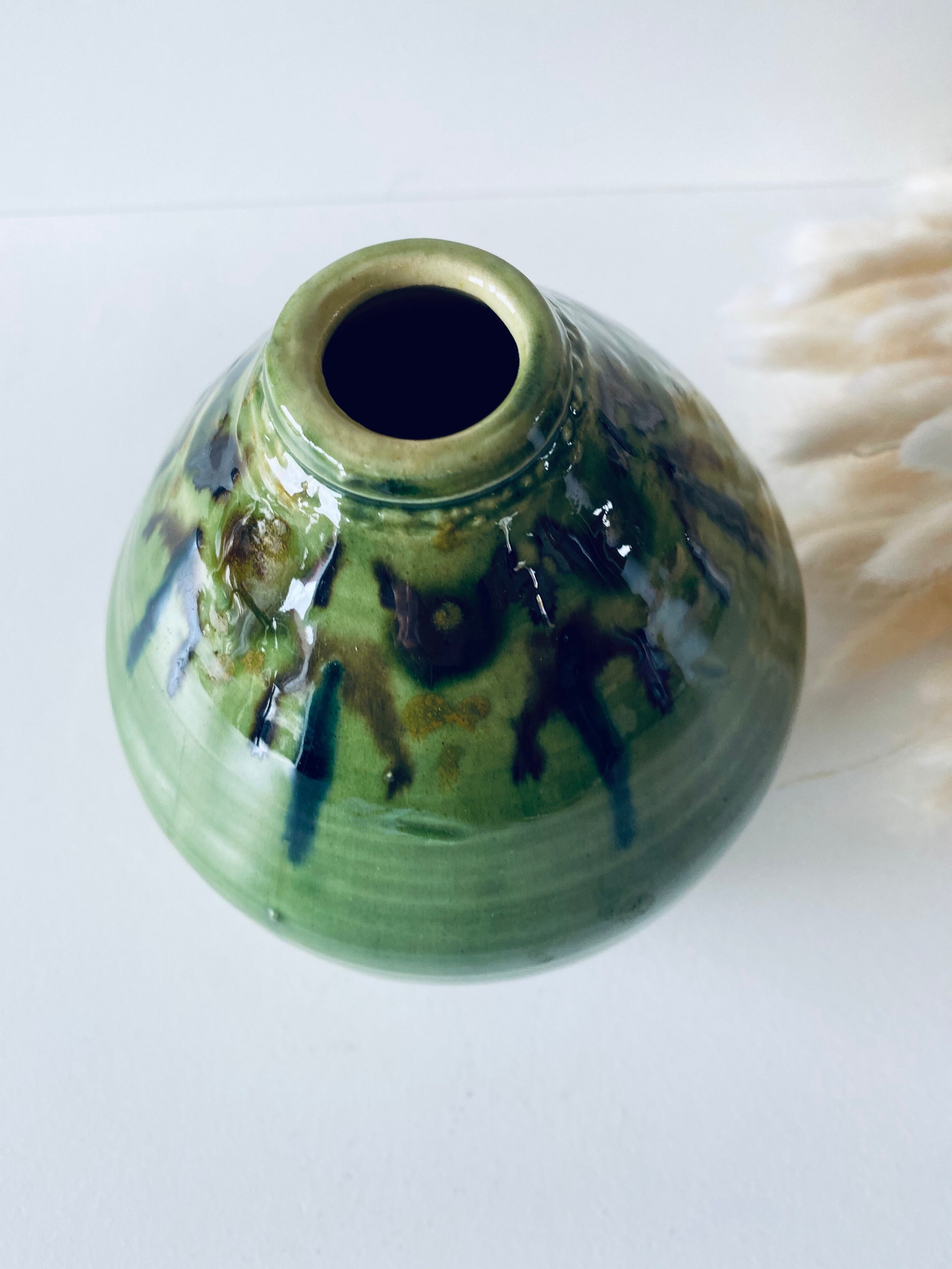 Signed ceramic green vase
