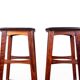 4 Danish high stools, rosewood and black leather, Knud Bent for Dyrlund.