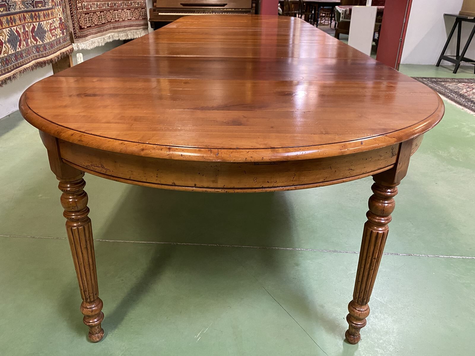 Louis Philippe round table 8 feet in cherry with 6 extensions