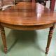 Louis Philippe round table 8 feet in cherry with 6 extensions