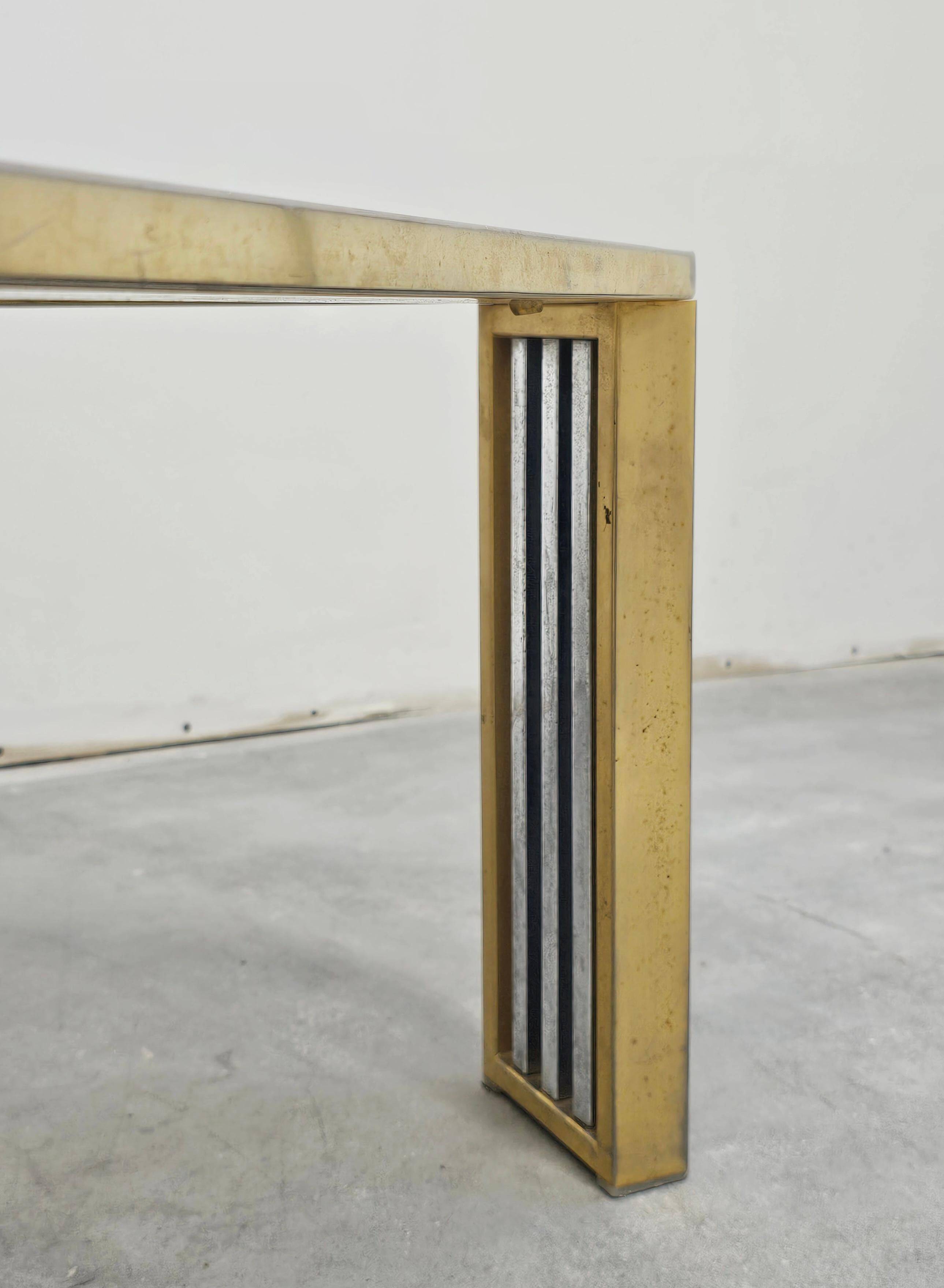 Large modernist coffee table attributed to Romeo Rega in steel and brass plating.