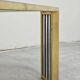 Large modernist coffee table attributed to Romeo Rega in steel and brass plating.